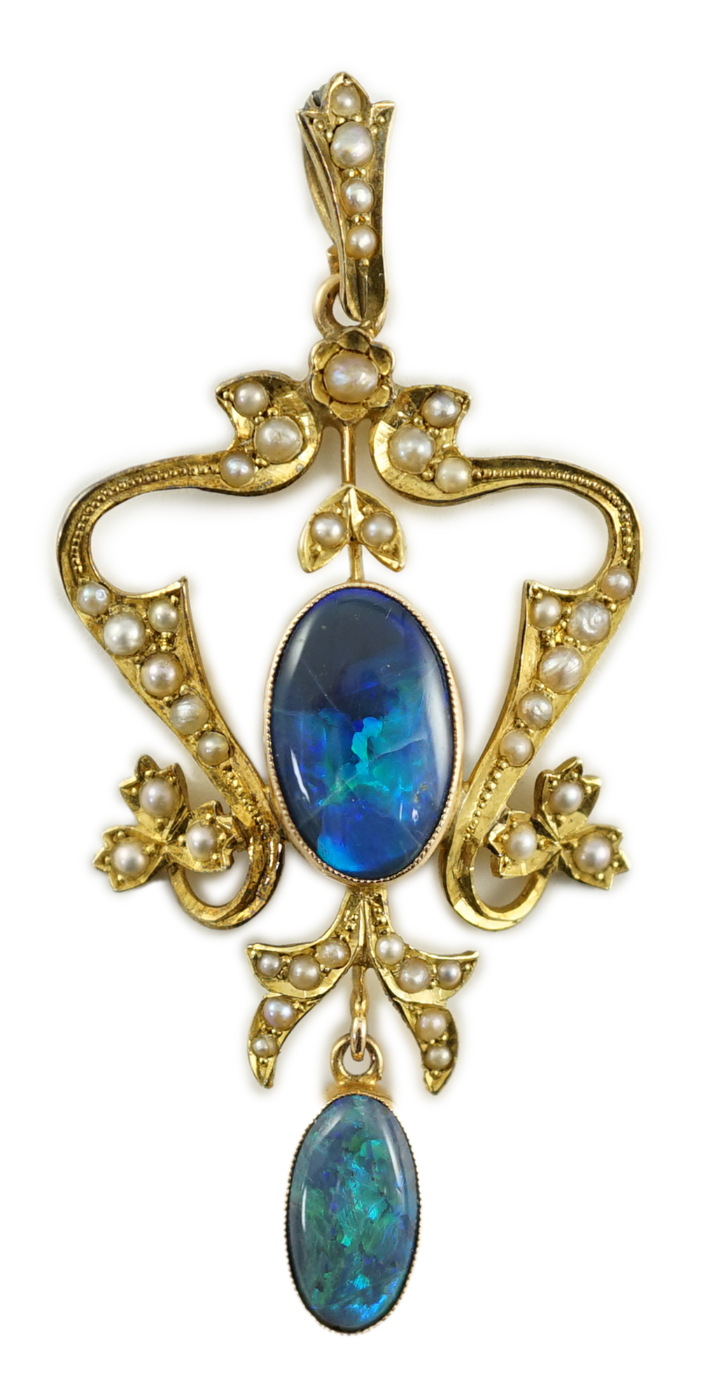 A late Victorian 15ct gold, two stone oval black opal and seed pearl cluster set drop pendant